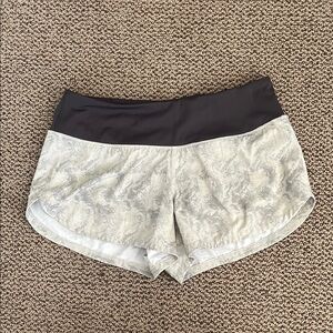 Vuori Athletic Shorts in Black and Cream
